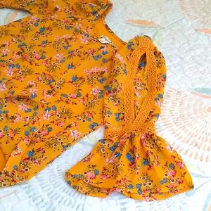 Dressy yellow with flowers, quarter length sleeves